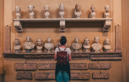 woman watching statues